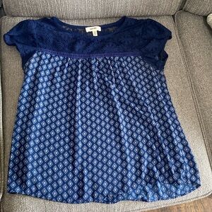 cute dark blue blouse. with diamond patterned all around.